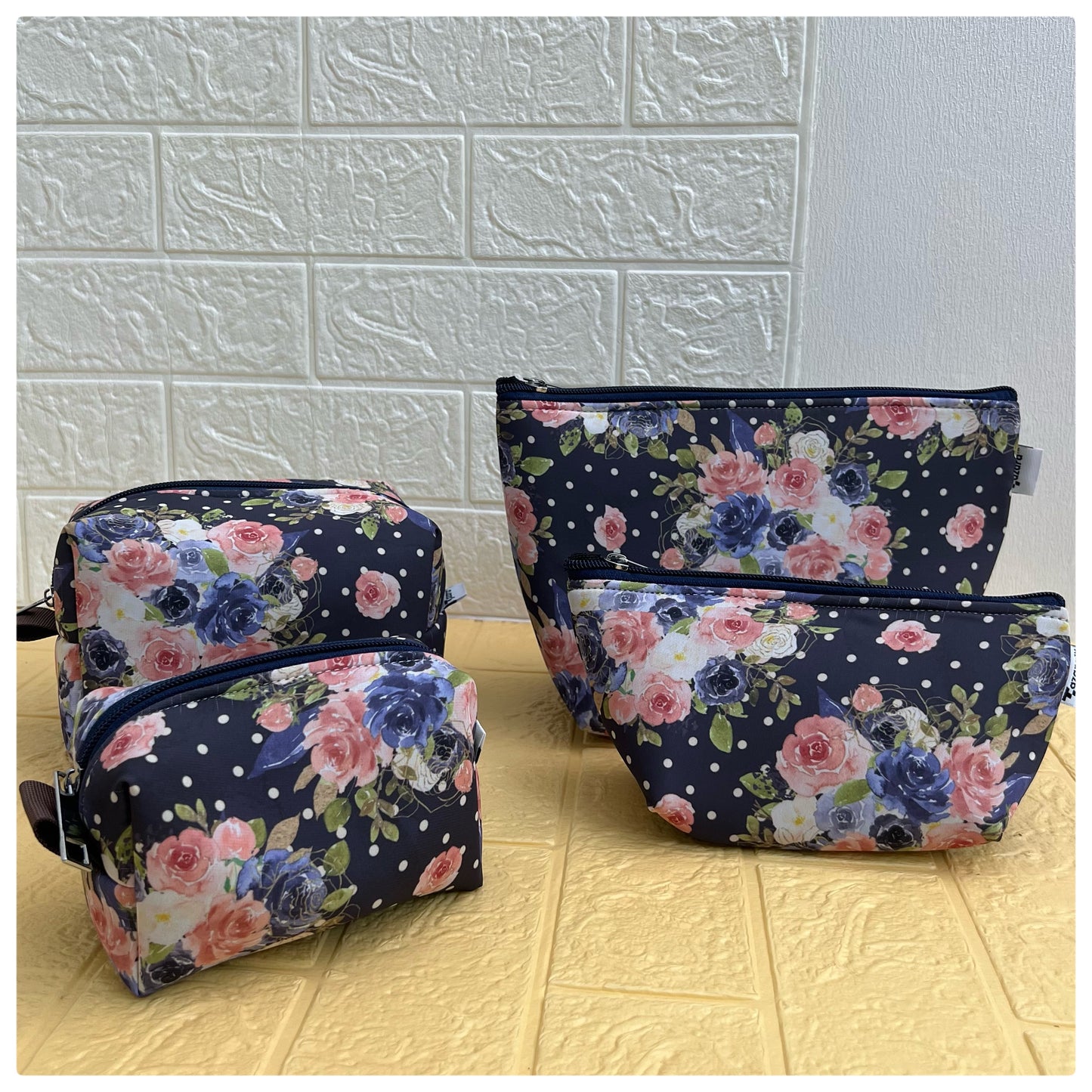 NAVY FLORAL POUCHES