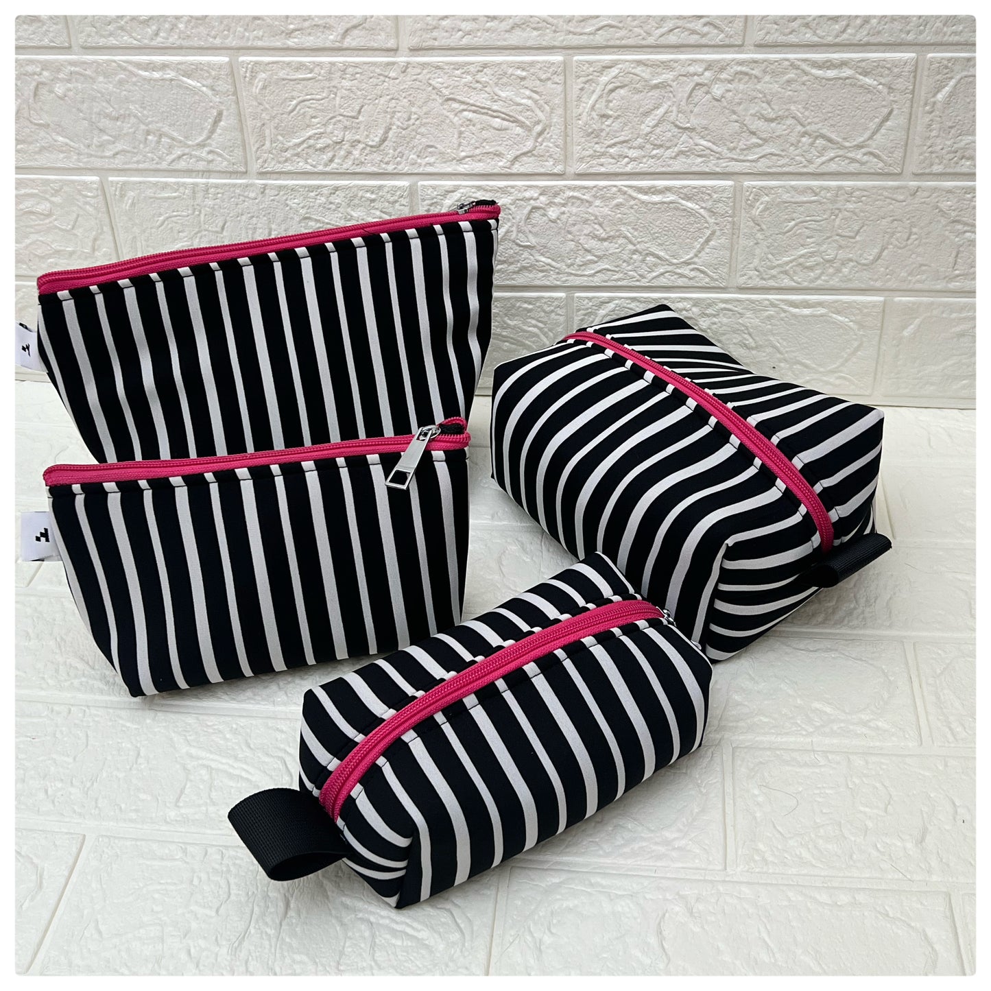 BNW STRIPE POUCHES