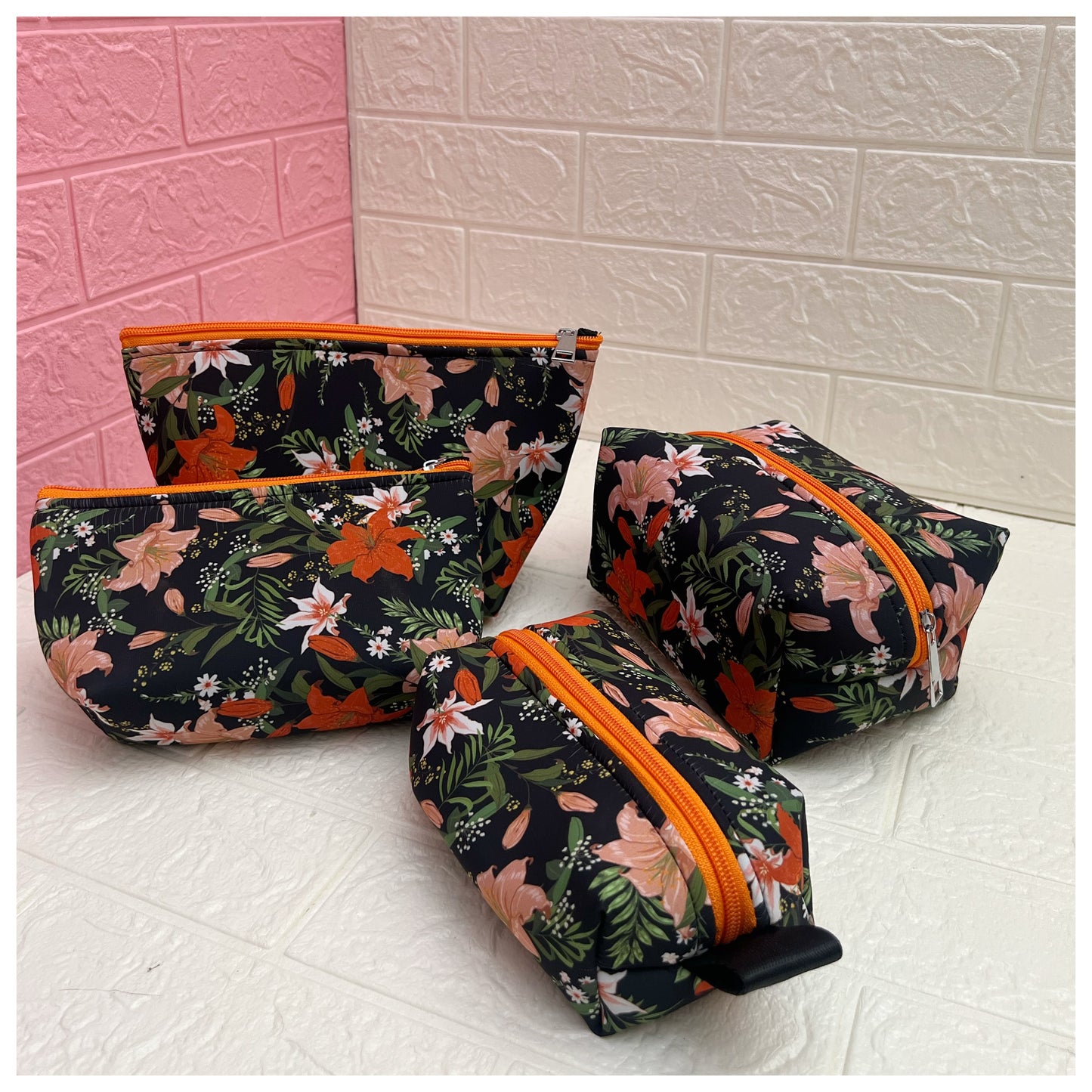 ORANGE BLACK FLORAL POUCHES