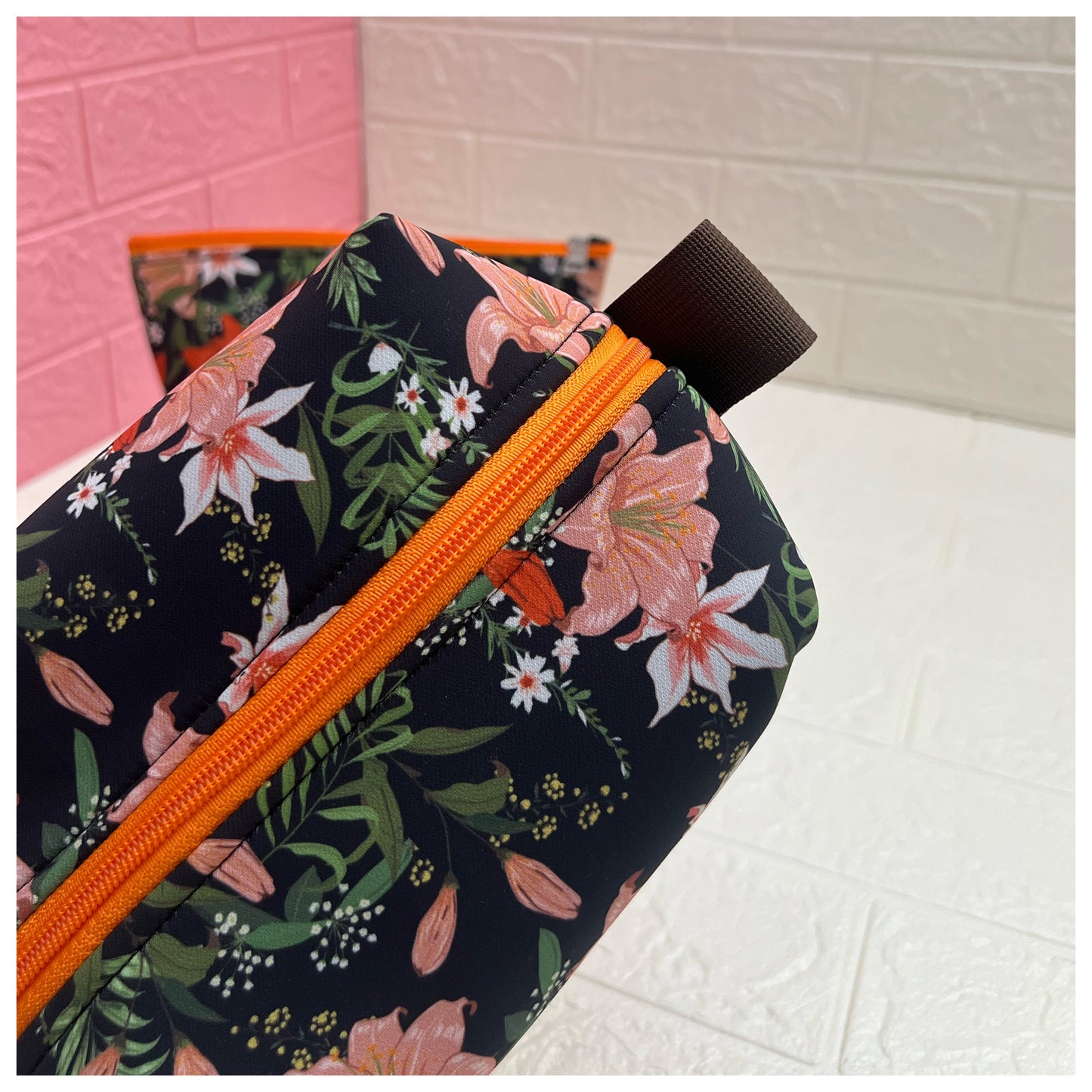 ORANGE BLACK FLORAL POUCHES