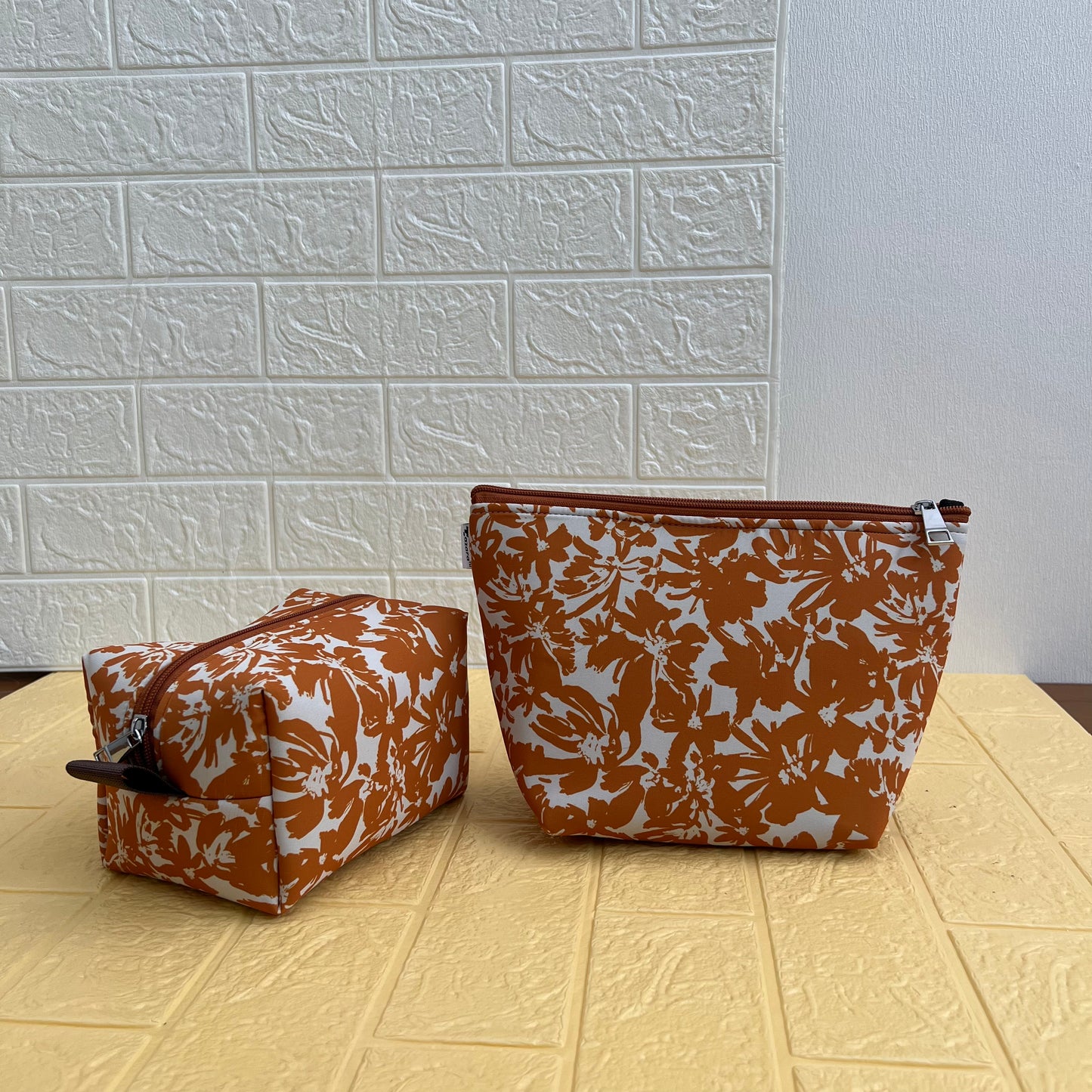 BROWN FLORAL POUCHES