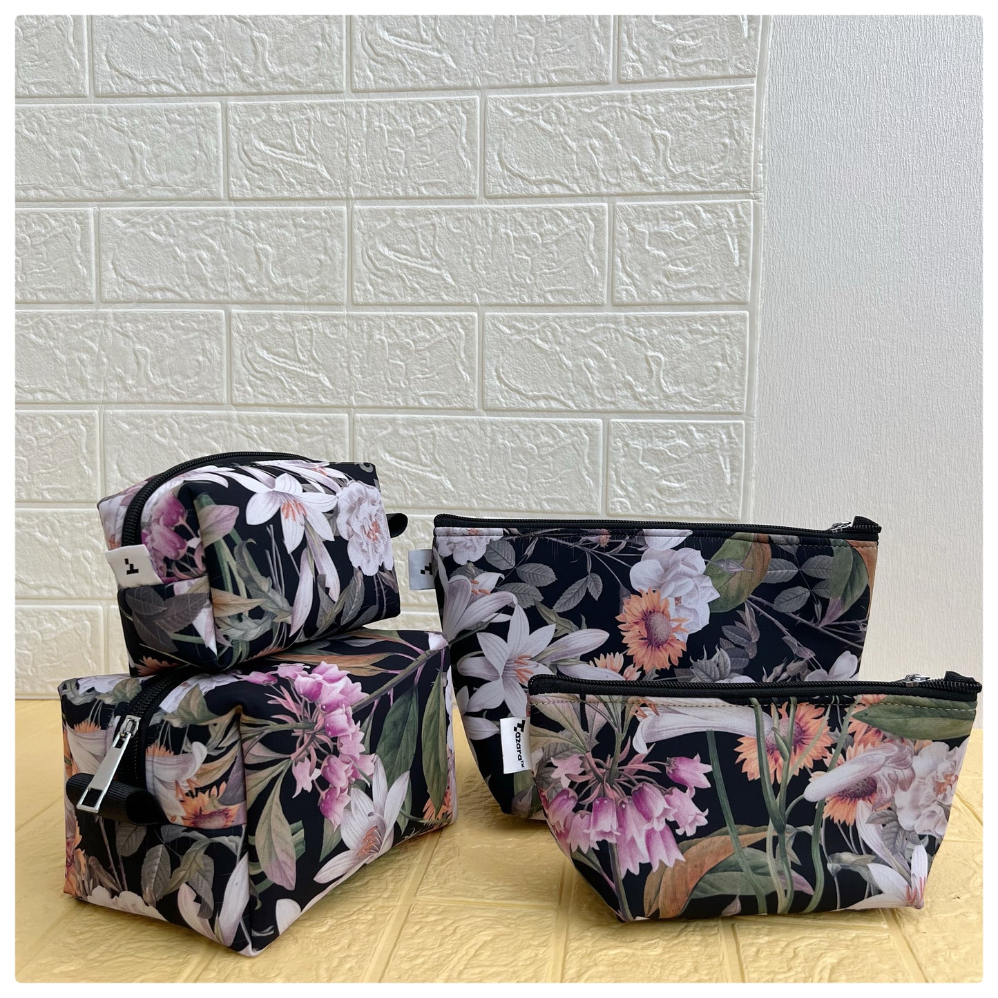 BLACK FLORAL POUCHES