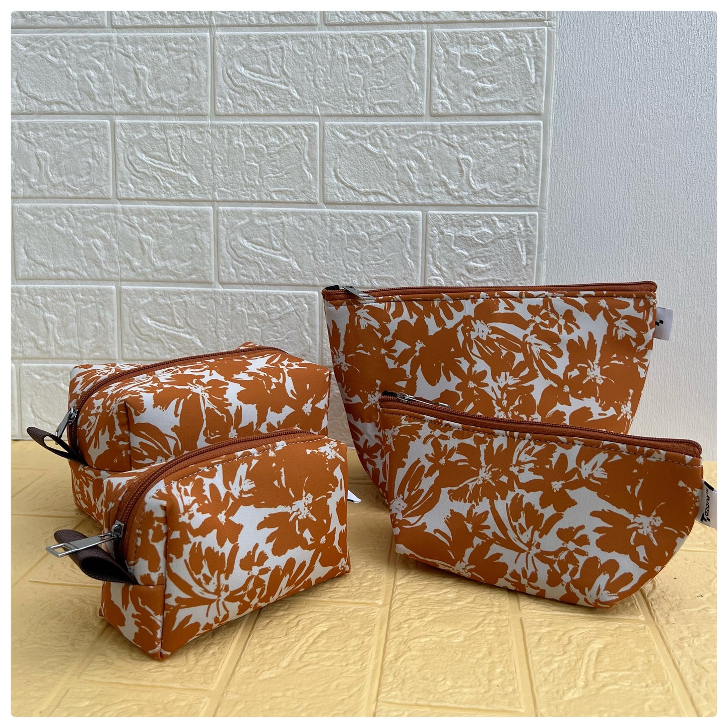 BROWN FLORAL POUCHES