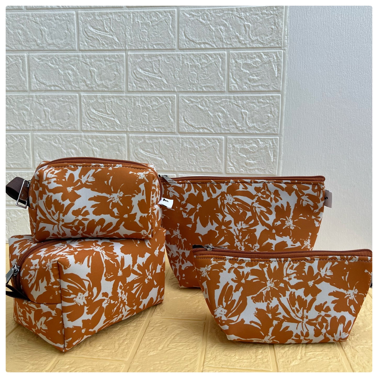 BROWN FLORAL POUCHES