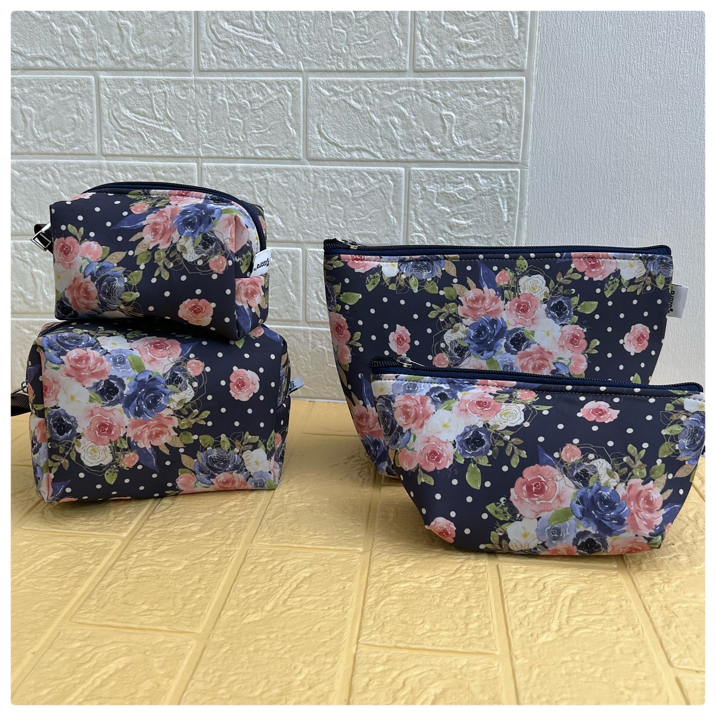 NAVY FLORAL POUCHES