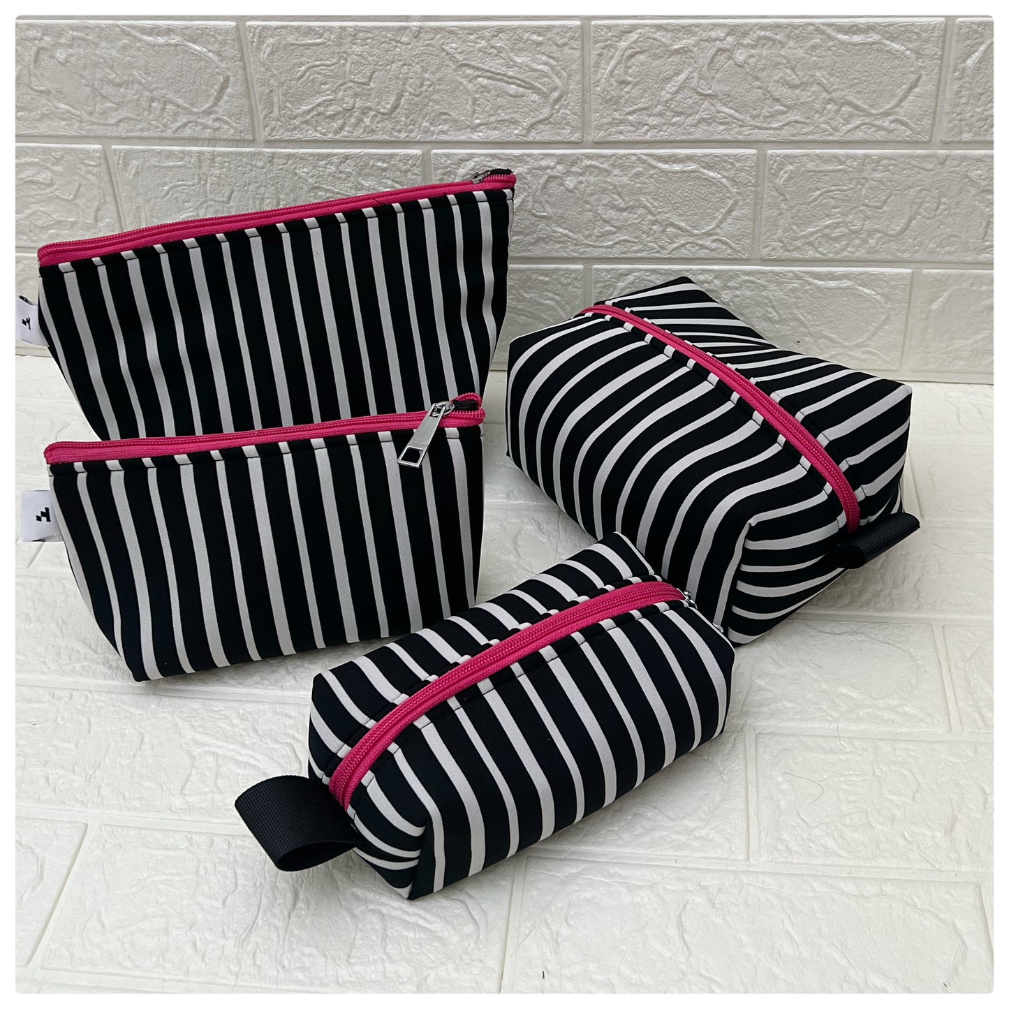 BNW STRIPE POUCHES