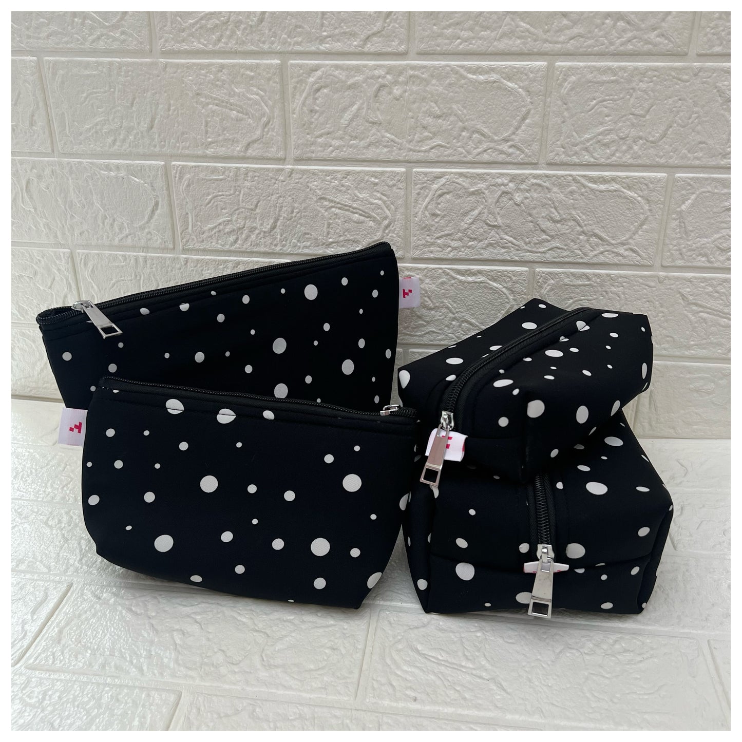 BLACK SMALL BIG POLKA POUCHES