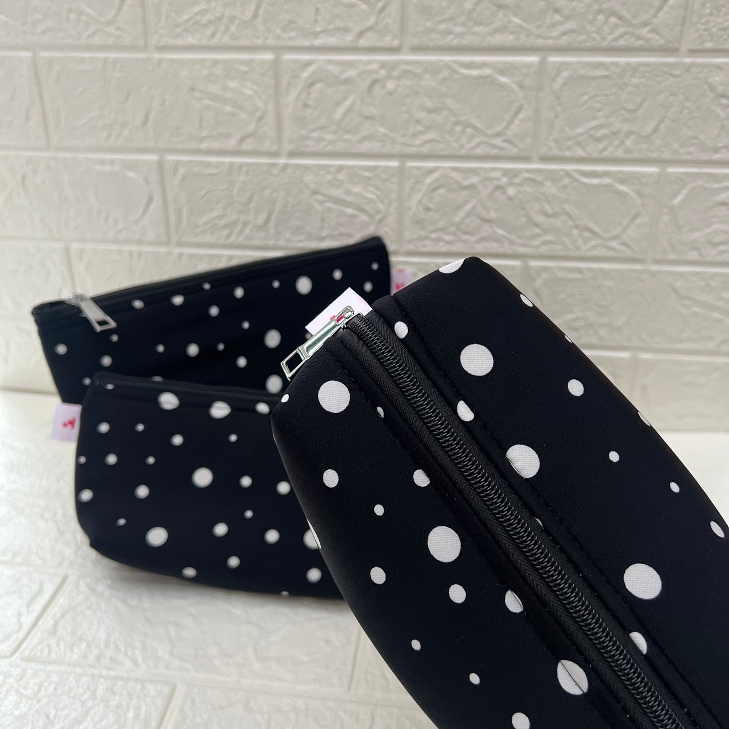 BLACK SMALL BIG POLKA POUCHES