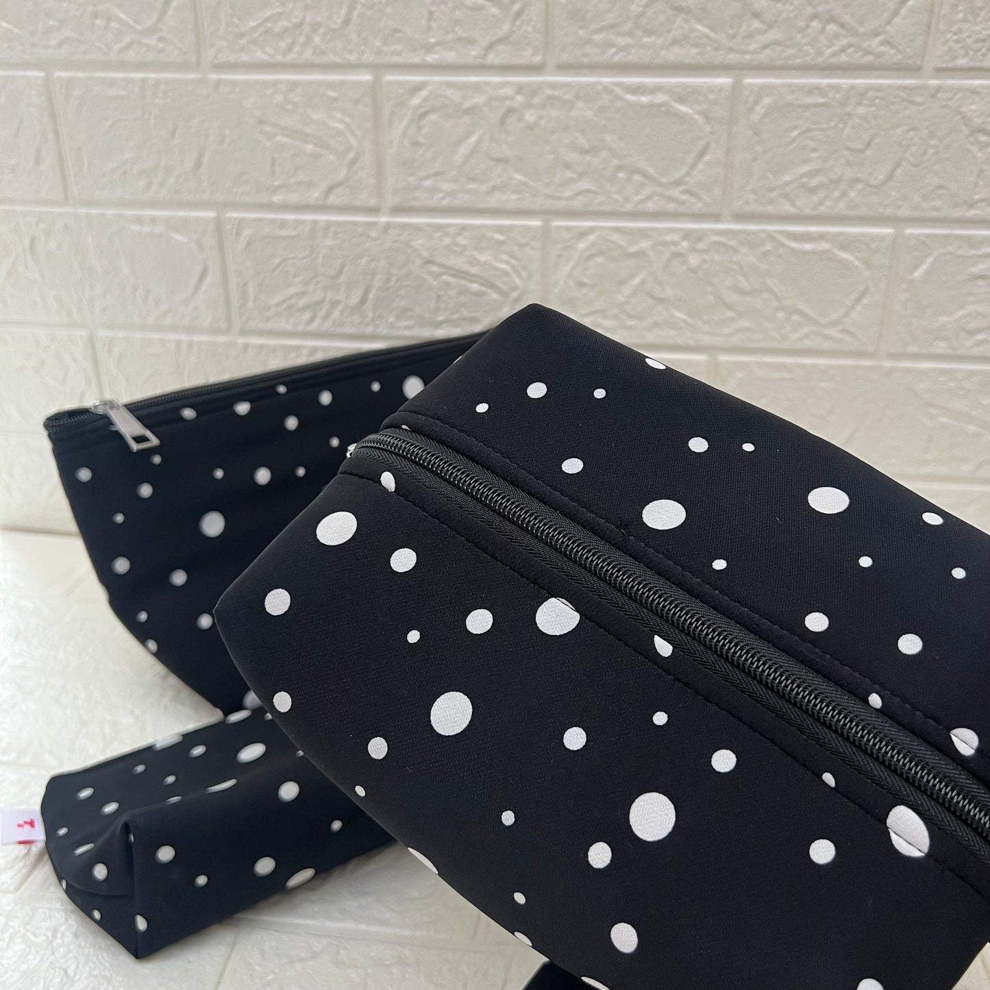BLACK SMALL BIG POLKA POUCHES