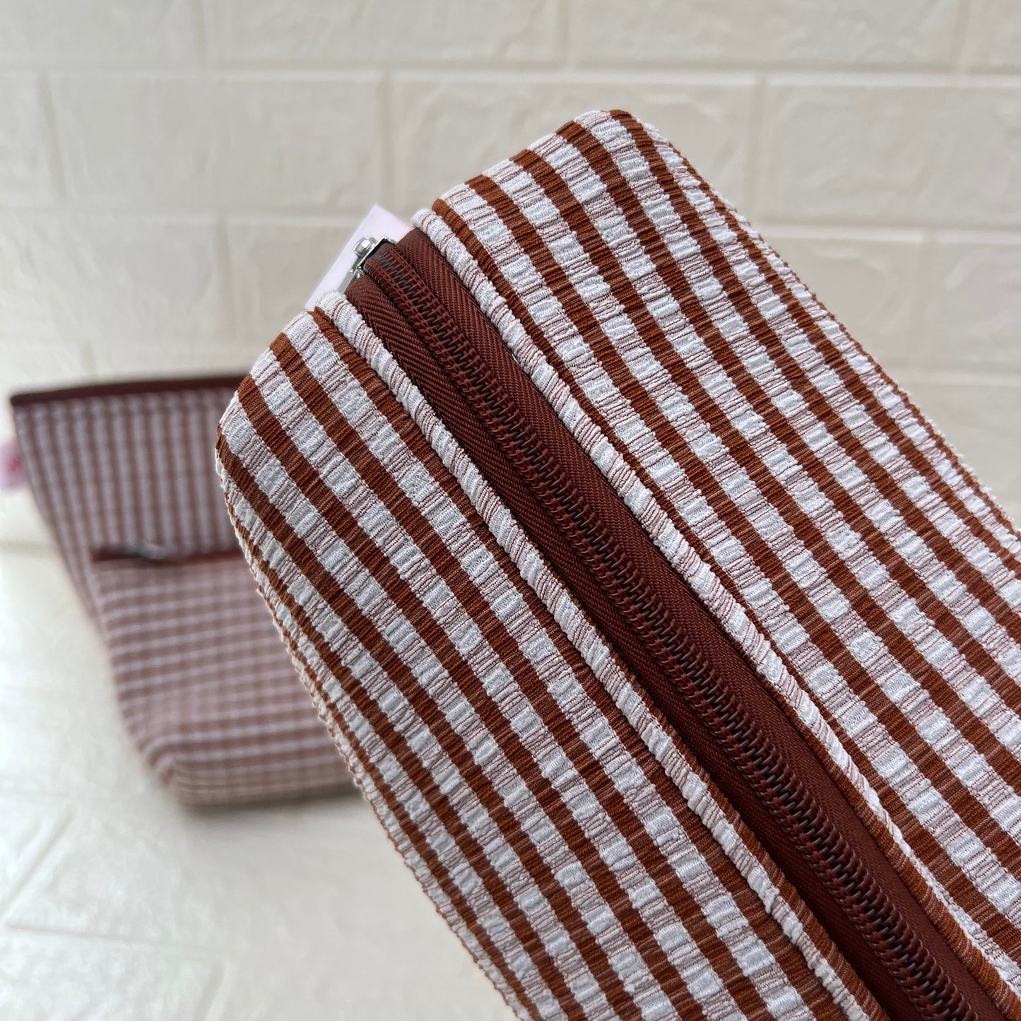 BROWN CHECK POUCHES