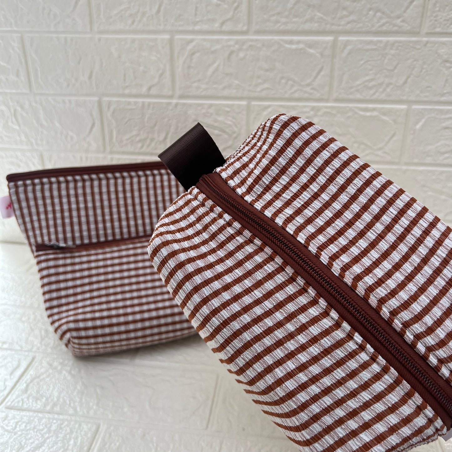 BROWN CHECK POUCHES
