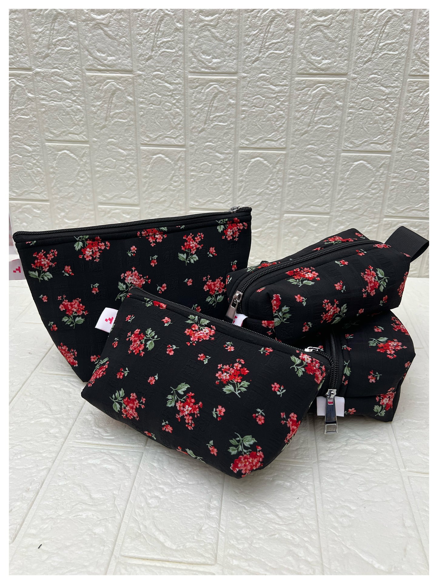 BLACK REDBUD FLORAL POUCHES