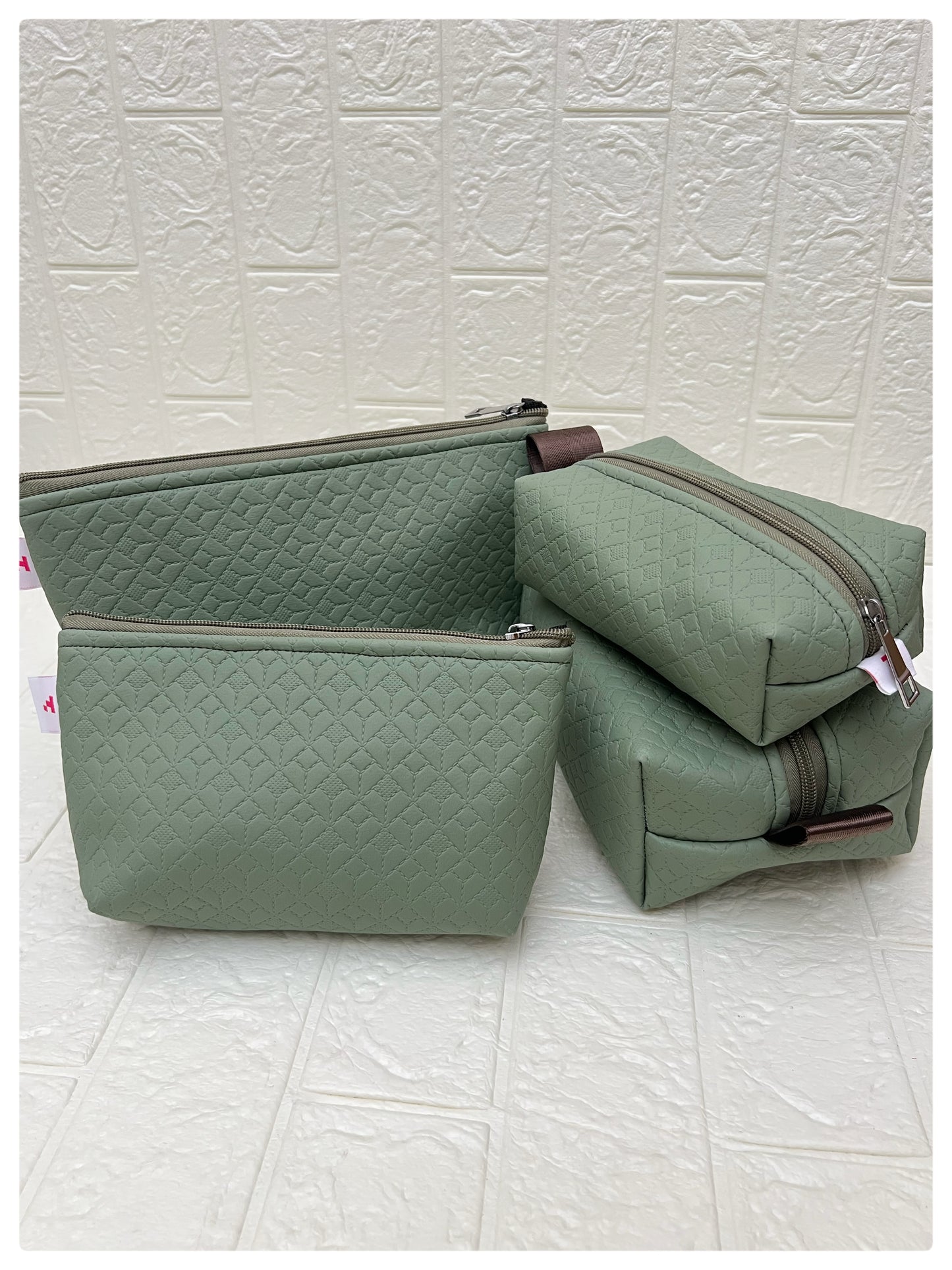 EMERALD FAUX LEATHER POUCHES