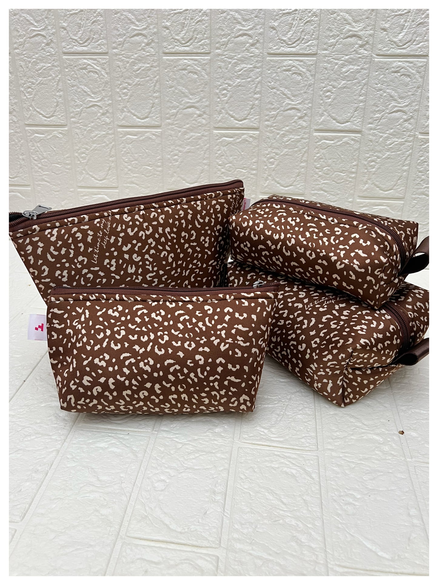BROWN JAGUAR POUCHES