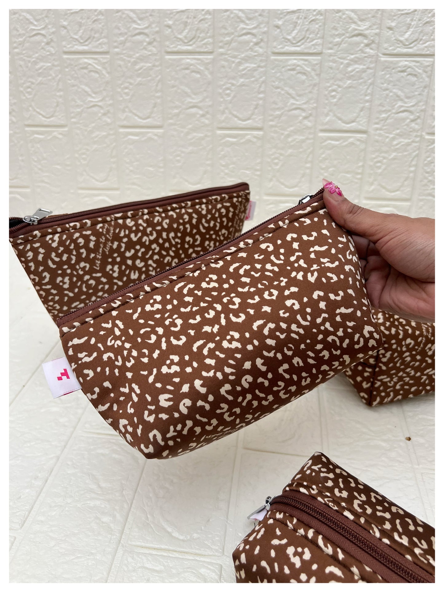 BROWN JAGUAR POUCHES
